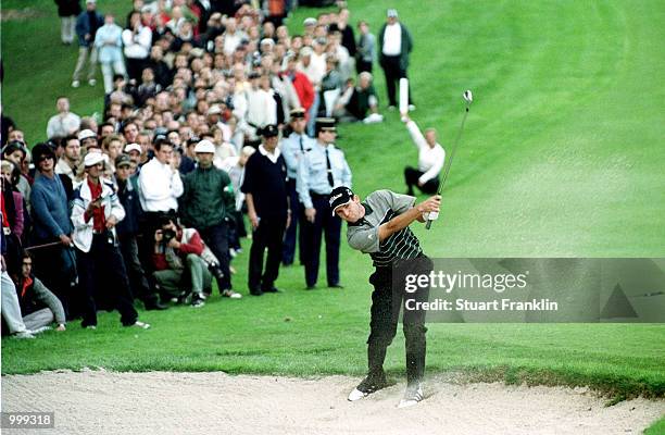 Sergio Garcia of Spain hits his ball from the bunker on the 16th hole during Lancome Trophy French Open held at St-Nom-la-Breteche Golf Club, Paris,...