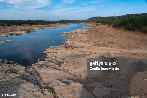 guadiana river at broken bridge of ajuda - ajuda stockfoto's en -beelden