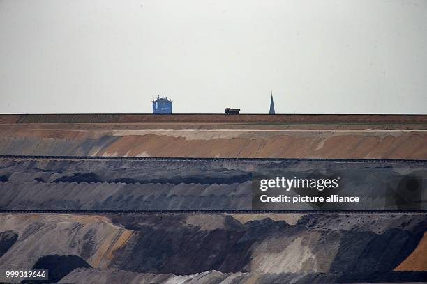 Dpatop - A trailer truck traveling along the edges of the Garzweiler surface mine near Erkelenz, Germany, 24 August 2017. No protests have been...