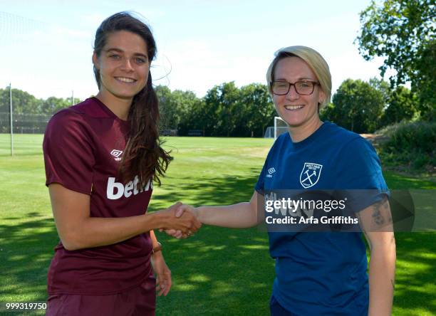 West ham United Ladies Unveil New signing Tessel Middag seen here with Karen Ray at Rush Green on July 2, 2018 in Romford, England.