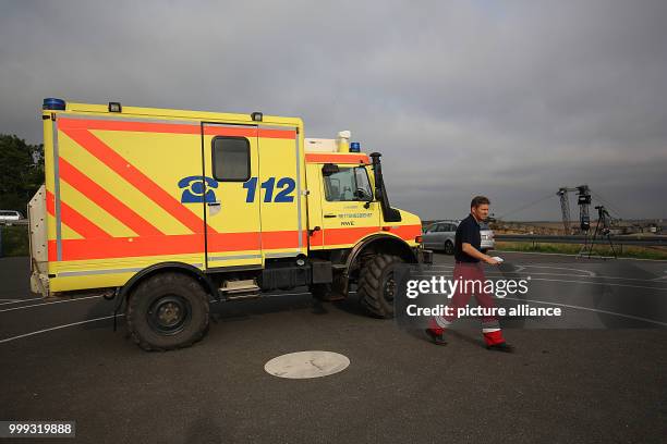 Vehicle of RWE's rescue services parked on the edges of the Garzweiler surface mine near Erkelenz, Germany, 24 August 2017. No protests have been...