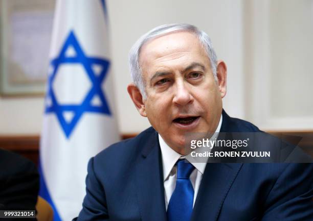 Israeli Prime Minister Benjamin Netanyahu speaks during the weekly cabinet meeting at his office in Jerusalem on July 15, 2018.