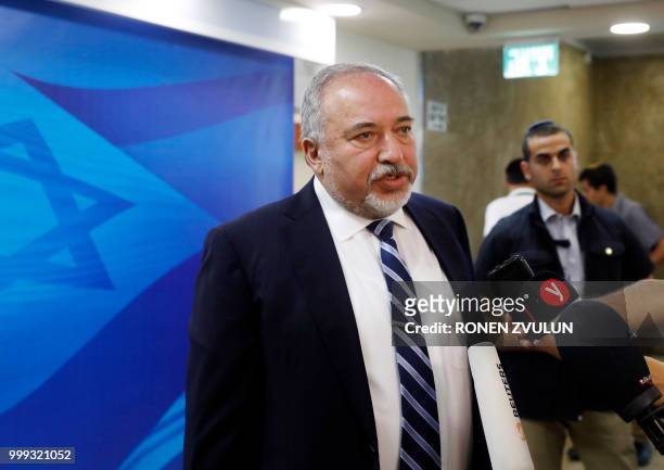 Israeli defence Minister Avigdor Lieberman speaks to reporters ahead of the weekly cabinet meeting at his office in Jerusalem on July 15, 2018.