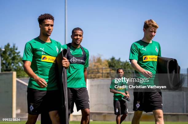 Keanan Bennetts, Alassane Plea and Andreas Poulsen during a training session of Borussia Moenchengladbach at Borussia-Park on July 15, 2018 in...