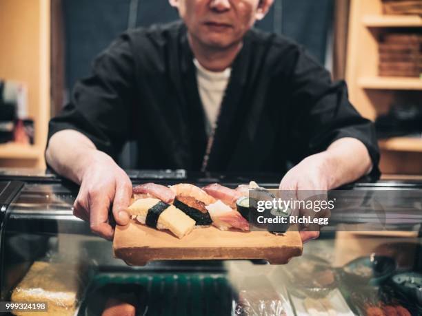tokyo japan sushi chef - sushi stock pictures, royalty-free photos & images