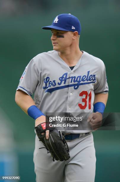 Joc Pederson of the Los Angeles Dodgers runs to the dugout during the game against the Washington Nationals at Nationals Park on May 19, 2018 in...