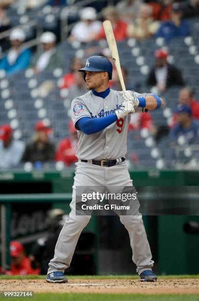 Yasmani Grandal of the Los Angeles Dodgers bats against the Washington Nationals at Nationals Park on May 19, 2018 in Washington, DC.