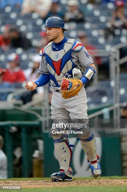 Yasmani Grandal of the Los Angeles Dodgers catches against the Washington Nationals at Nationals Park on May 19, 2018 in Washington, DC.