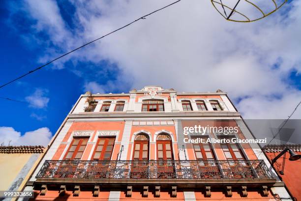 city street view with church tower in la laguna town on tenerife island - laguna stockfoto's en -beelden