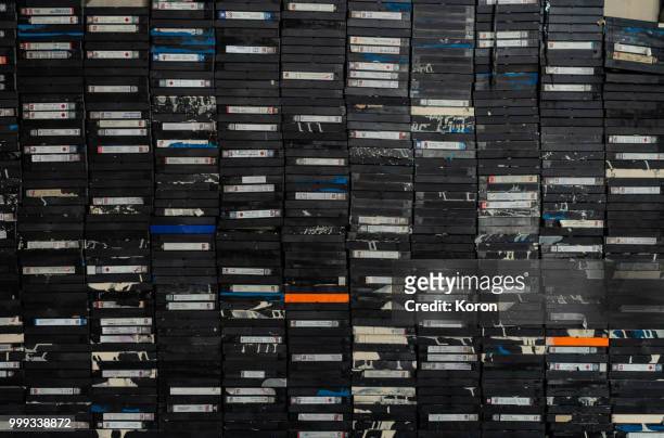 a pile of tapes - film industry fotografías e imágenes de stock