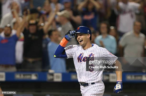Brandon Nimmo of the New York Mets reacts after he hit a 10th inning pinch-hit walk-off home run against the Philadelphia Phillies during a game at...