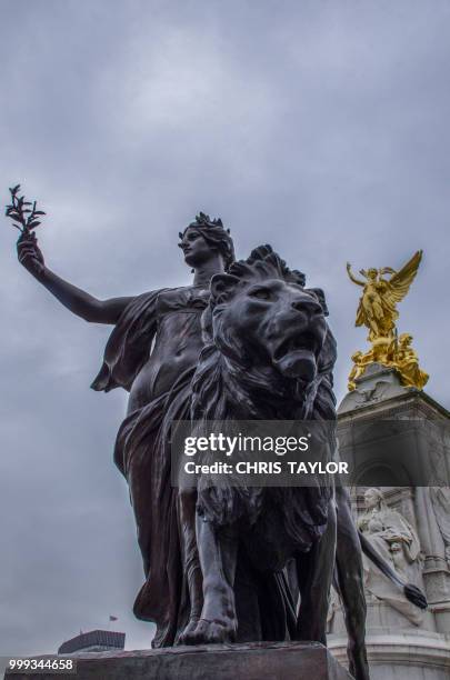 lady & lion - animal representation stock pictures, royalty-free photos & images