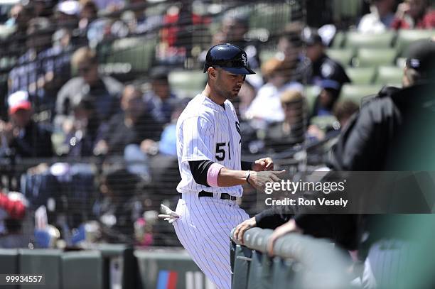 Alex Rios of the Chicago White Sox is greeted by teammates during the game against the Toronto Blue Jays on May 9, 2010 at U.S. Cellular Field in...
