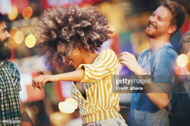friends dancing at a concert. - europe live in concert stock pictures, royalty-free photos & images