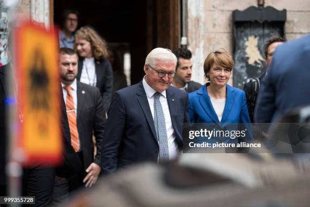 German President Frank-Walter Steinmeier and his wife Elke Budenbender leaving the Kanepes Cultural Centre after a discussion with youth and young...