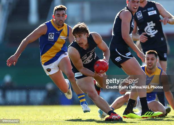 Samuel Fisher of the Blues runs with the ball during the round 15 VFL match between the Northern Blues and Williamstown at Ikon Park on July 15, 2018...