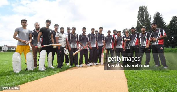 Players of the PAF Cricket Club team standing together for a team picture in Pfaffenhofen an der Ilm, Germany, 13 August 2017. Just like in other...