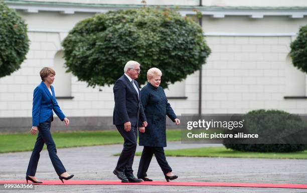 German President Frank-Walter Steinmeier and his wife Elke Budenbender being greeted with military honours by the President of the Republic of...