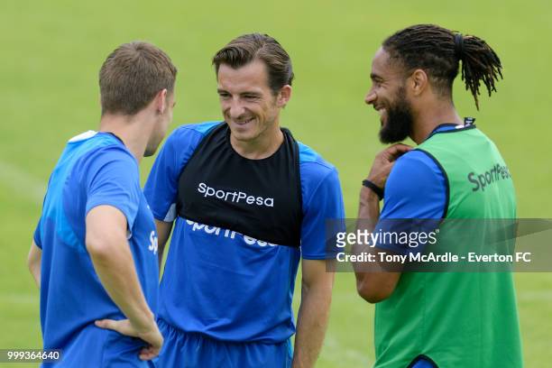 Leighton Baines and Ashley Williams chat to Seamus Coleman of Everton during the Everton training session ahead of the pre-season friendly match...
