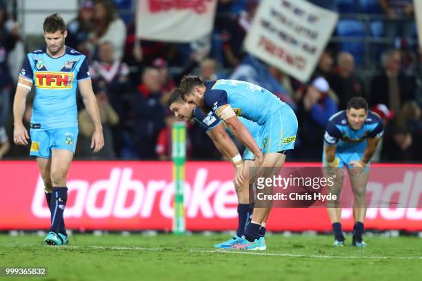 Titans look on after losing the round 18 NRL match between the Gold Coast Titans and the Sydney Roosters at Cbus Super Stadium on July 15, 2018 in...