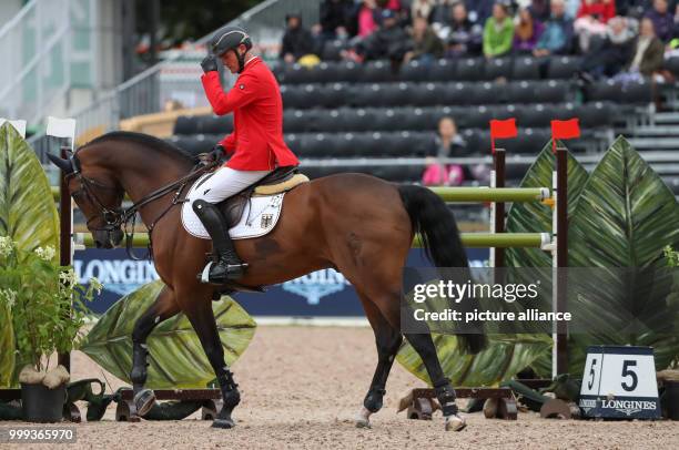 German show jumper Maurice Tebbel on his horse Chacco's Son during the Show Jumping Team Event of the FEI European Championships 2017 in Gothenburg,...