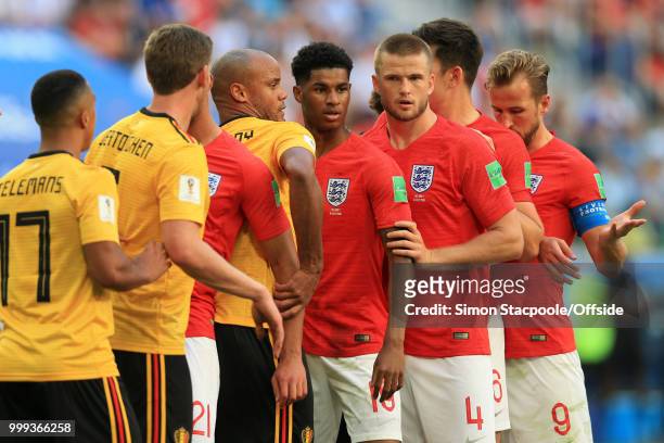 Vincent Kompany of Belgium struggles to mark Marcus Rashford of England and Eric Dier of England during the 2018 FIFA World Cup Russia 3rd Place...