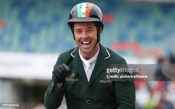 Irish show jumper Cian O'Connor on his horse Good Luck during the Show Jumping Team Event of the FEI European Championships 2017 in Gothenburg,...