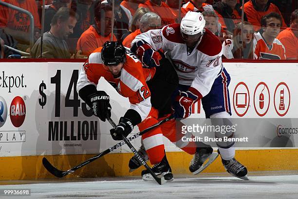 Subban of the Montreal Canadiens fights for the puck against Simon Gagne of the Philadelphia Flyers in Game 1 of the Eastern Conference Finals during...