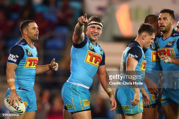 Jarrod Wallace of the Titans celebrates a try during the round 18 NRL match between the Gold Coast Titans and the Sydney Roosters at Cbus Super...