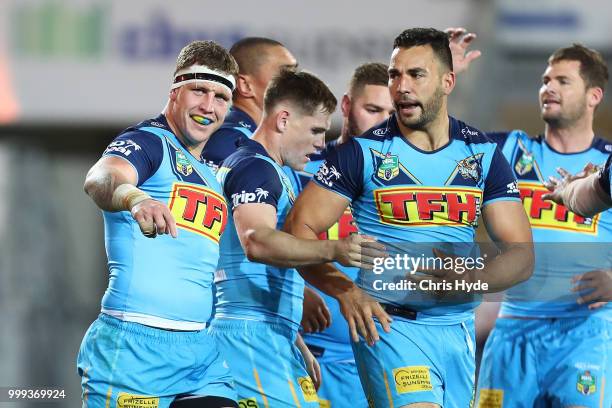 Jarrod Wallace of the Titans celebrates a try during the round 18 NRL match between the Gold Coast Titans and the Sydney Roosters at Cbus Super...