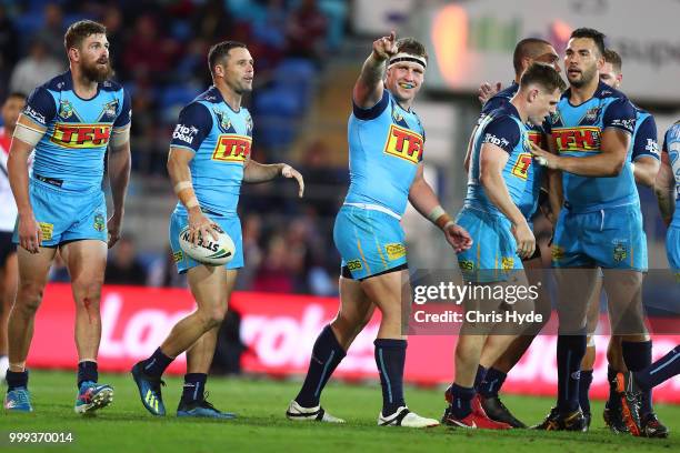 Jarrod Wallace of the Titans celebrates a try during the round 18 NRL match between the Gold Coast Titans and the Sydney Roosters at Cbus Super...