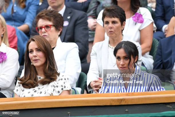 Catherine, Duchess of Cambridge and Meghan, Duchess of Sussex attend day twelve of the Wimbledon Tennis Championships at the All England Lawn Tennis...