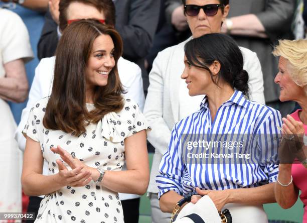 Catherine, Duchess of Cambridge and Meghan, Duchess of Sussex attend day twelve of the Wimbledon Tennis Championships at the All England Lawn Tennis...