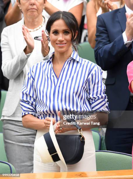 Meghan, Duchess of Sussex attends day twelve of the Wimbledon Tennis Championships at the All England Lawn Tennis and Croquet Club on July 14, 2018...