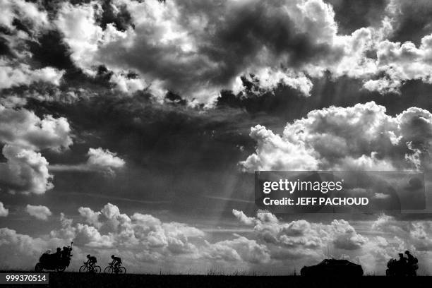 Netherlands' Marco Minnaard and France's Fabien Grellier ride during their two-men breakaway in the eighth stage of the 105th edition of the Tour de...