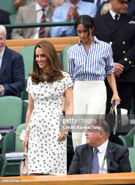 Catherine, Duchess of Cambridge and Meghan, Duchess of Sussex attend day twelve of the Wimbledon Tennis Championships at the All England Lawn Tennis...