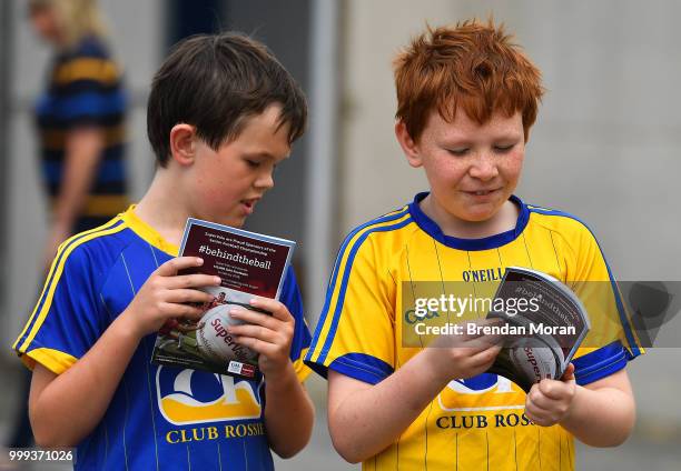 Laois , Ireland - 7 July 2018; Young fans check out their match programmes prior to the GAA Football All-Ireland Senior Championship Round 4 match...