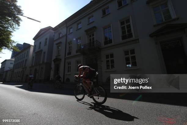 Athletes perform in the bike leg during the Age Group olympic distance race at the ITU World Triathlon Hamburg 2018 on July 15, 2018 in Hamburg,...