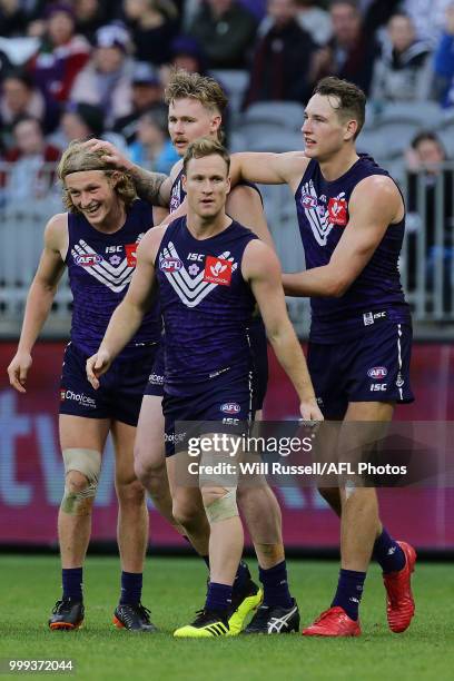 Cam McCarthy of the Dockers celebrates after scoring a goal during the round 17 AFL match between the Fremantle Dockers and the Port Adelaide Power...