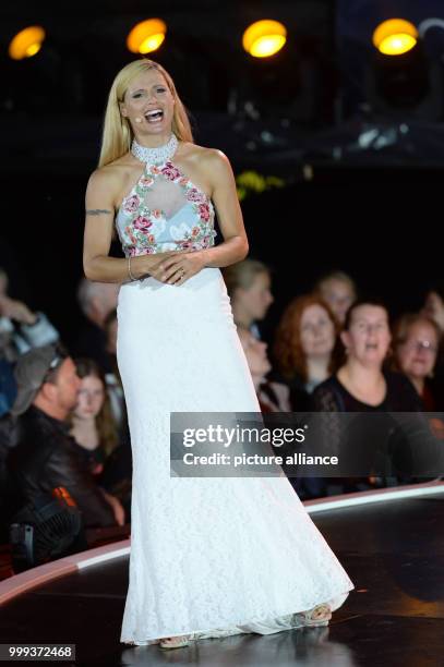 Moderator Michelle Hunziker performing onstage during the ZDF Summer Hits Festival 2017 in Timmendorfer Strand, Germany, 24 August 2017. Photo:...