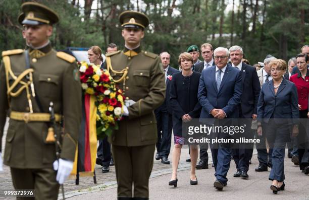 German President Frank-Walter Steinmeier and his wife Elke Buedenbender visiting the Paneriai Holocaust Memorial together with the Chairwoman of the...