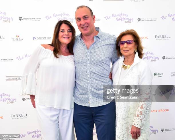 Karen Amster-Young, Benjamin Young and Marion N. Waxman attend The Samuel Waxman Cancer Research Foundation 14th Annual The Hamptons Happening on...