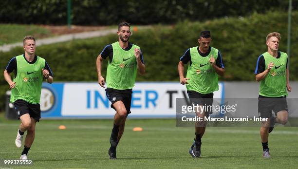 Emmers Xian Ghislaine, Roberto Gagliardini, Gabriele Zappa and Maj Roric of FC Internazionale run during the FC Internazionale training session at...