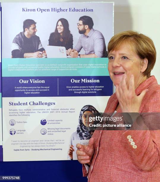 German Chancellor Angela Merkel visiting the Berlin start-up Kiron and being briefed on the company's work in Berlin, Germany, 25 August 2017. The...