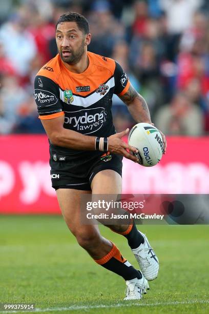 Benji Marshall of the Tigers runs the ball during the round 18 NRL match between the St George Illawarra Dragons and the Wests Tigers at UOW Jubilee...