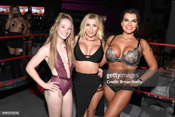 Model Jessica Weaver appears with contestants of "Foxy Boxing" as she hosts Larry Flynt's Hustler Club Instagram party at Larry Flynt's Hustler Club...
