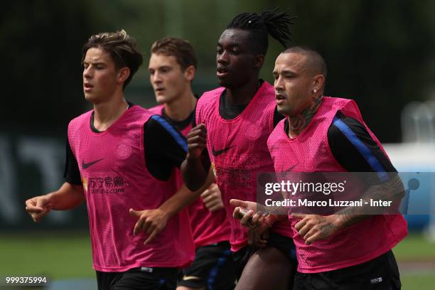 Elian Denirovic, Facundo Colidio, Yann Karamoh and Radja Nainggolan of FC Internazionale run during the FC Internazionale training session at the...