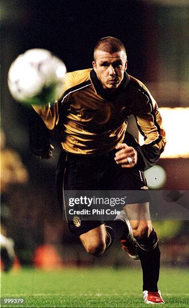 David Beckham of Manchester United charges down the ball during the FA Barclaycard Premiership match between Arsenal and Manchester United at...