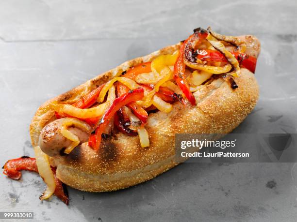 pepper and onions bratwurst dog - bun stock pictures, royalty-free photos & images