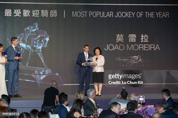 Jockey Joao Moreira receives the Most Popular Jockey of the Year trophy at 2017/18 HKJC Champion Awards Presentation Ceremony on July 13, 2018 in the...